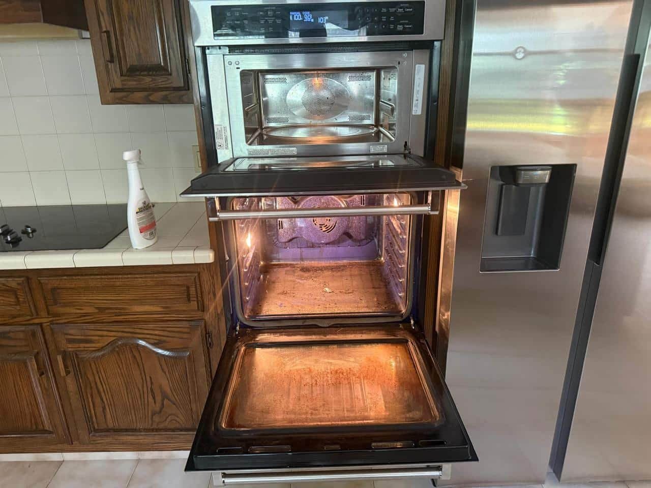 White Glove Solutions LI team cleaning a home oven